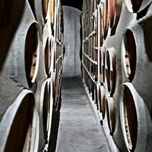 Artistic representation for Weekend Wine Guide : Concrete - ageing makes a comeback Let me know if you'd like me to try generating a few more titles!